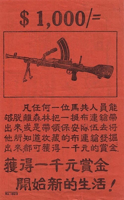 1953 British propaganda leaflet printed in red with a black illustration of a Bren light machine gun and Chinese text offering a $1,000 reward to Malayan Communist Party members who surrender or disclose hidden weapons during the Malayan Emergency.