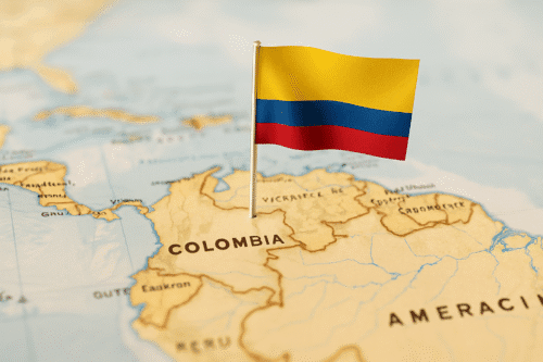 Map of northern South America focused on Colombia with the Colombian flag pinned into the territory.