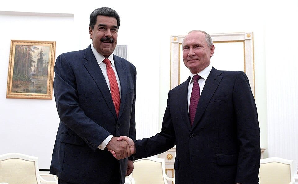 Venezuelan President Nicolás Maduro and Russian President Vladimir Putin shake hands during a formal meeting inside the Kremlin, September 2019.