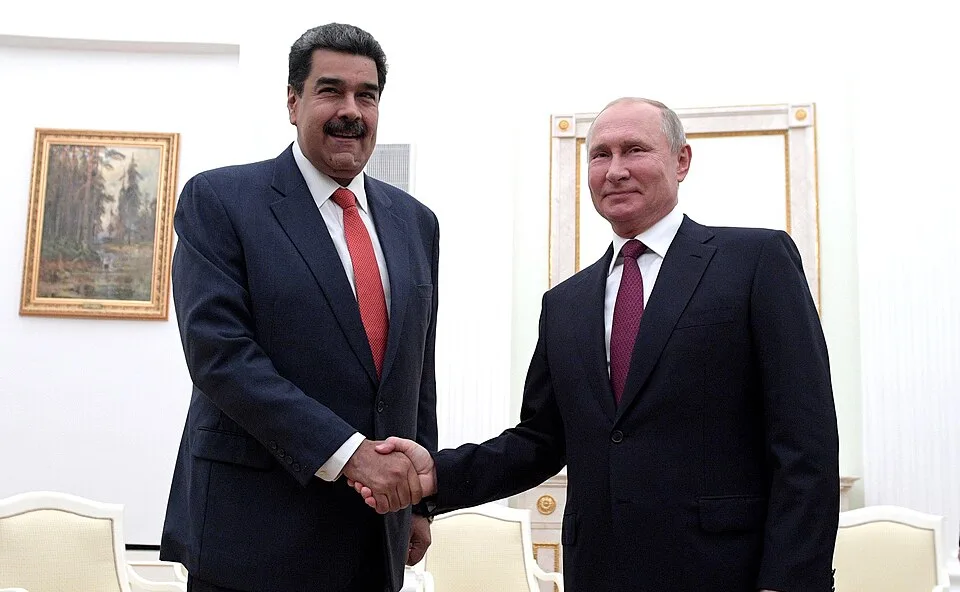 Venezuelan President Nicolás Maduro and Russian President Vladimir Putin shake hands during a formal meeting inside the Kremlin, September 2019.