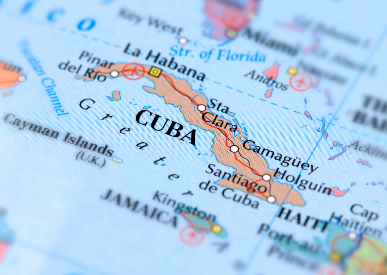 Alt text for the Cuba map image: Close-up map of Cuba showing the island's position in the Caribbean between Florida, Jamaica, and Haiti, with major cities Havana, Santa Clara, Camagüey, Holguín, and Santiago de Cuba marked along the central highway corridor.